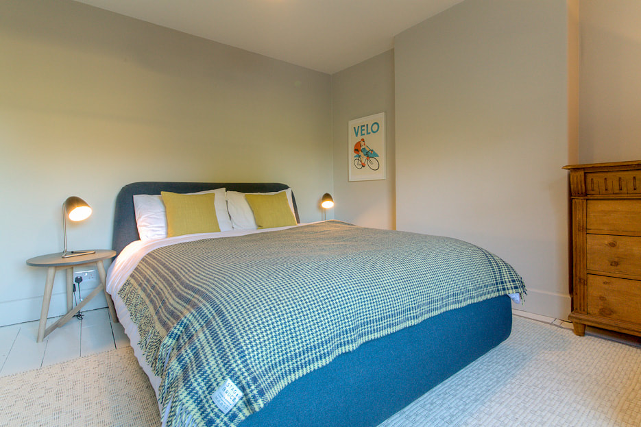Second bedroom with calm colour scheme