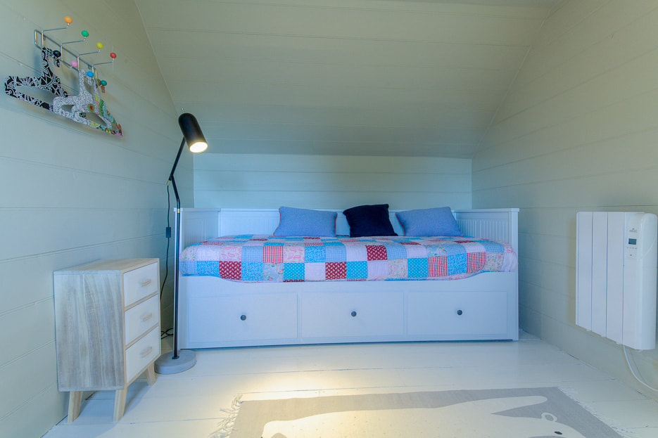 First attic room has daybed which converts to 2 singles